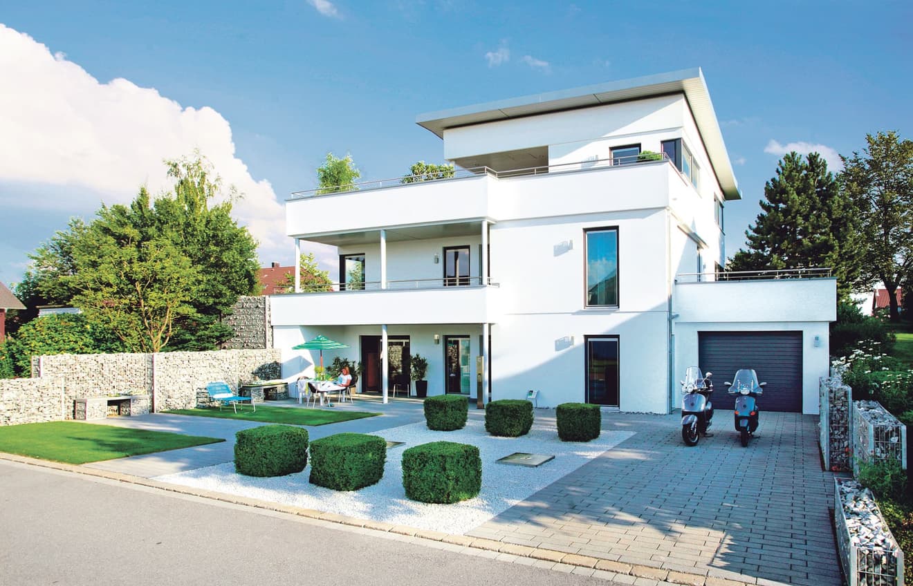 Kubushaus mit Dachterrasse und Garage als Hausanbau