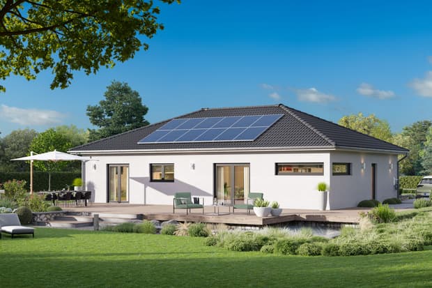 Außenansicht von Winkelbungalow mit Walmdach Garten