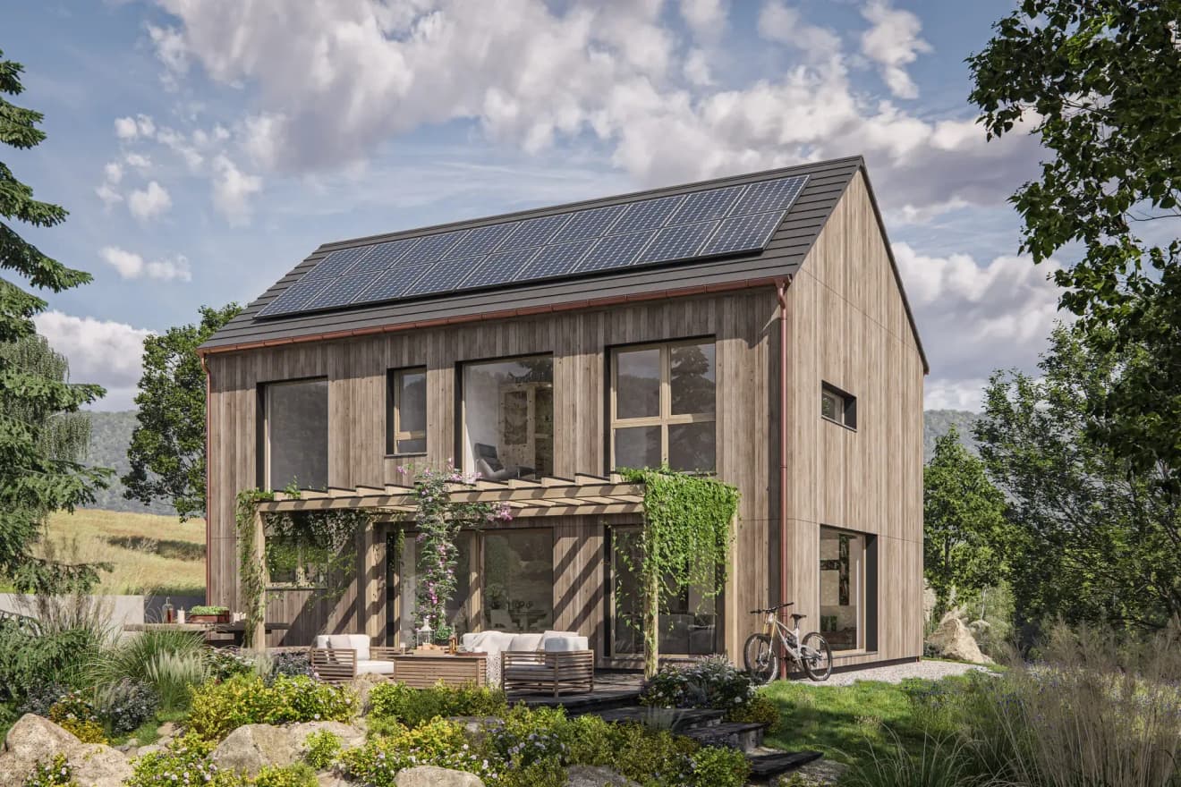 Modernes Fertighaus mit Satteldach und Holzfassade